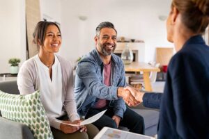 Homeowner reviewing comparable home prices and property details at a dining table